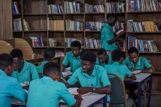 Students learning at Cosmos Schools